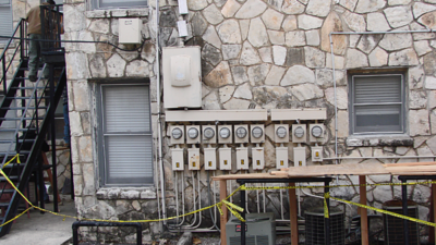 Rear Rock Wall With Electric Service